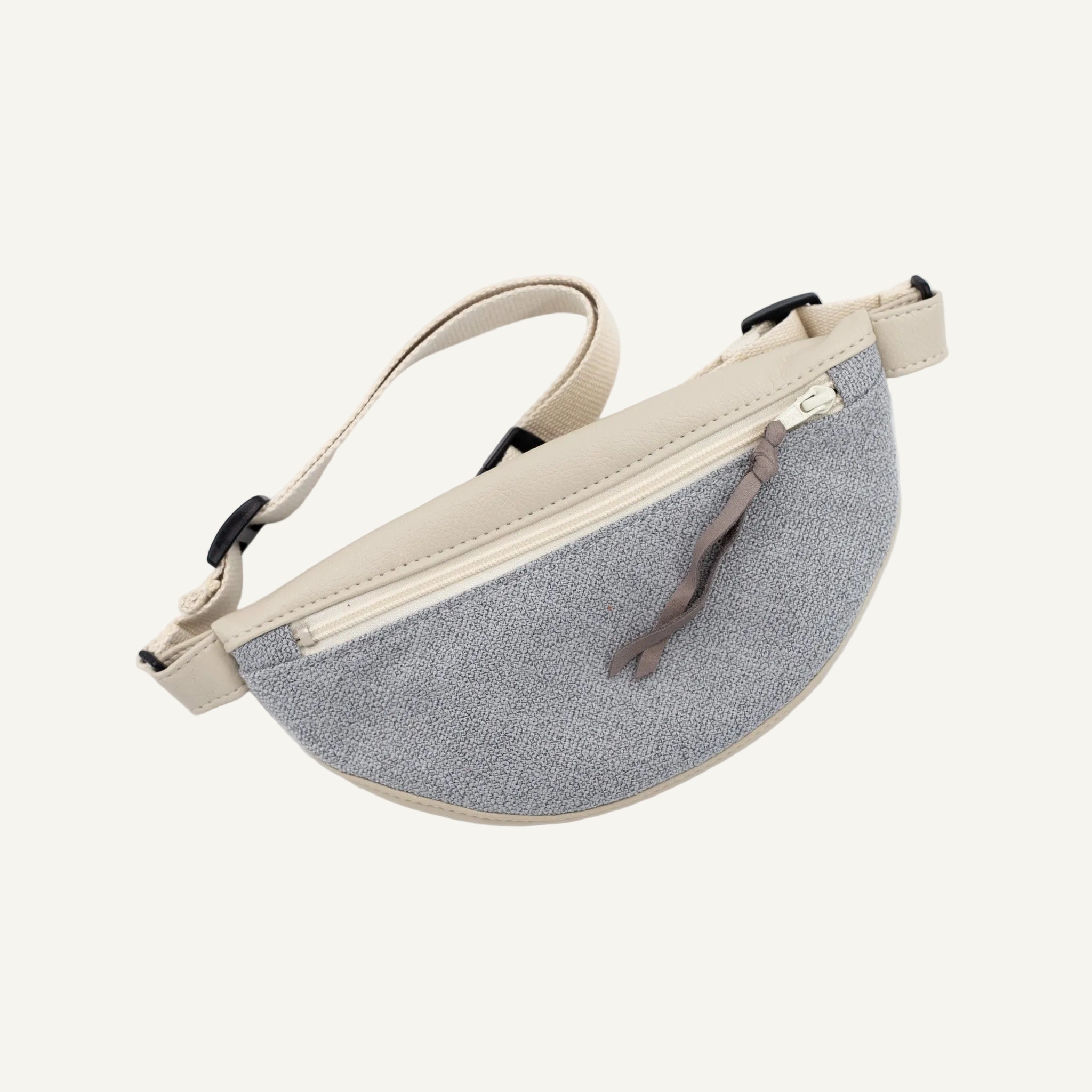 Gray waist bag with beige strap on a white background