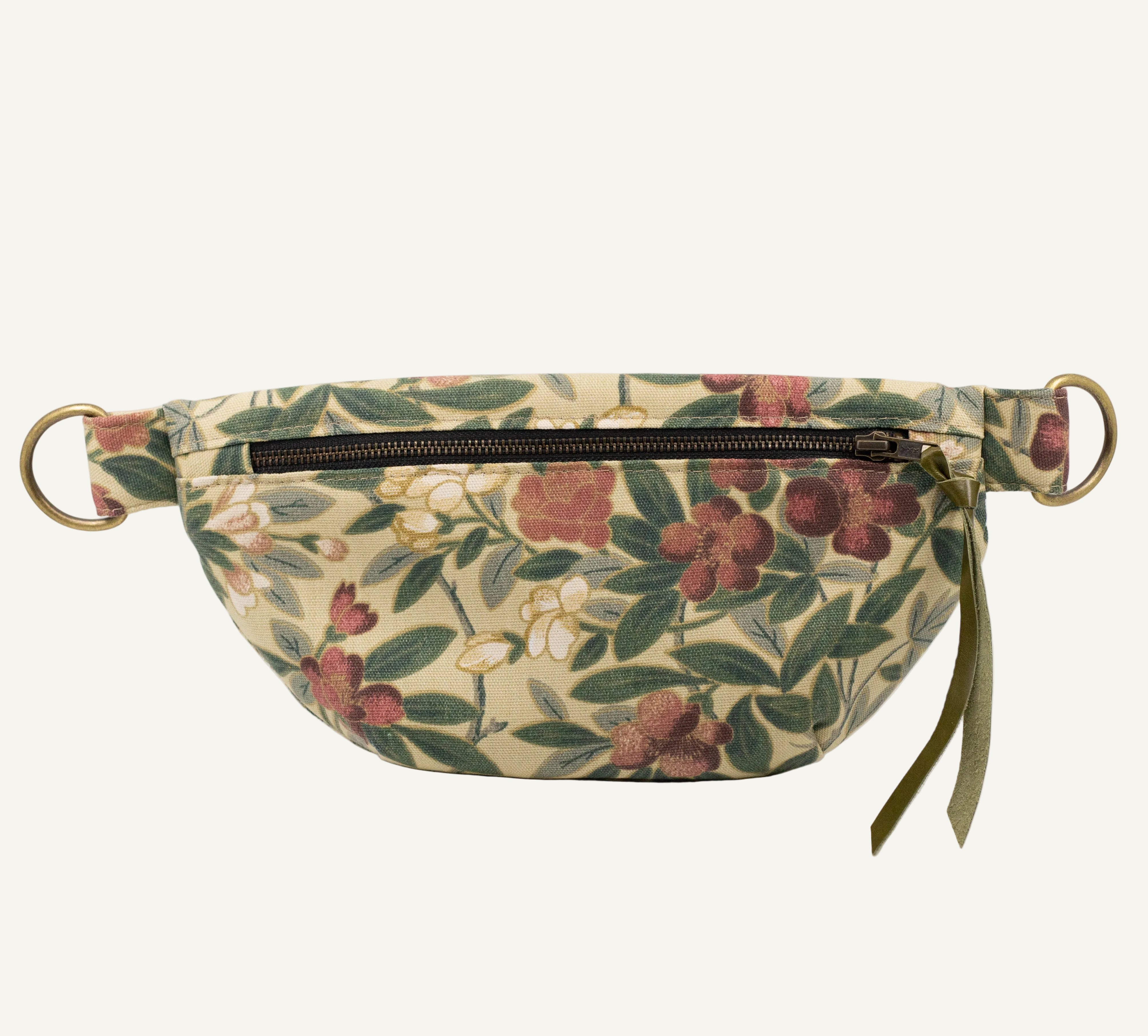 Floral-patterned waist bag on a white background