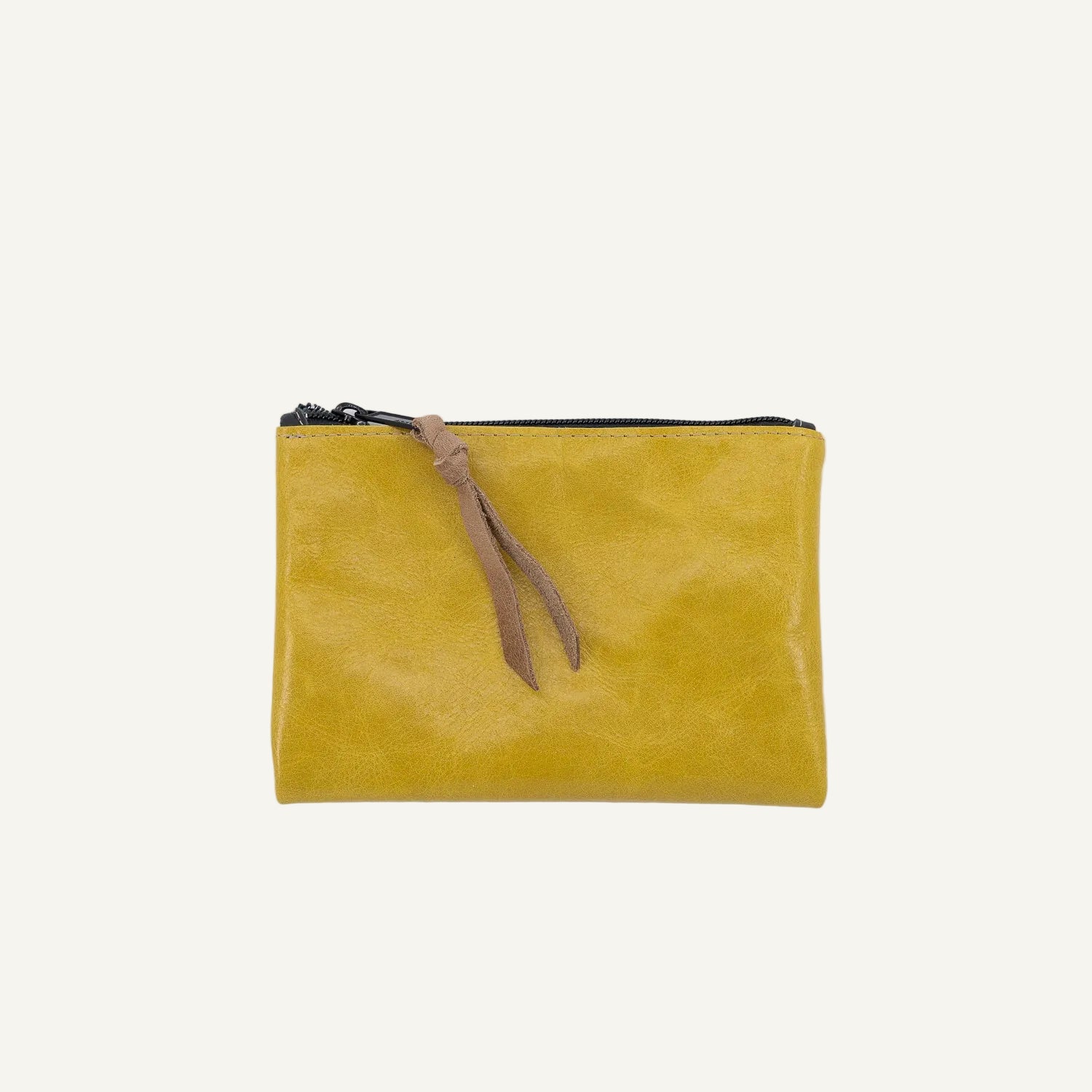 Yellow pouch with a brown zipper pull on a white background