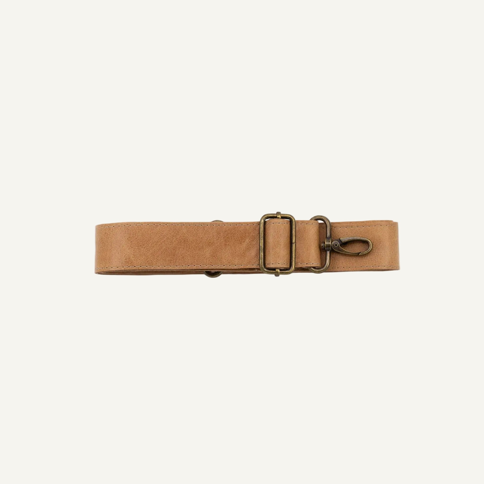 Brown belt with a gold buckle on a white background