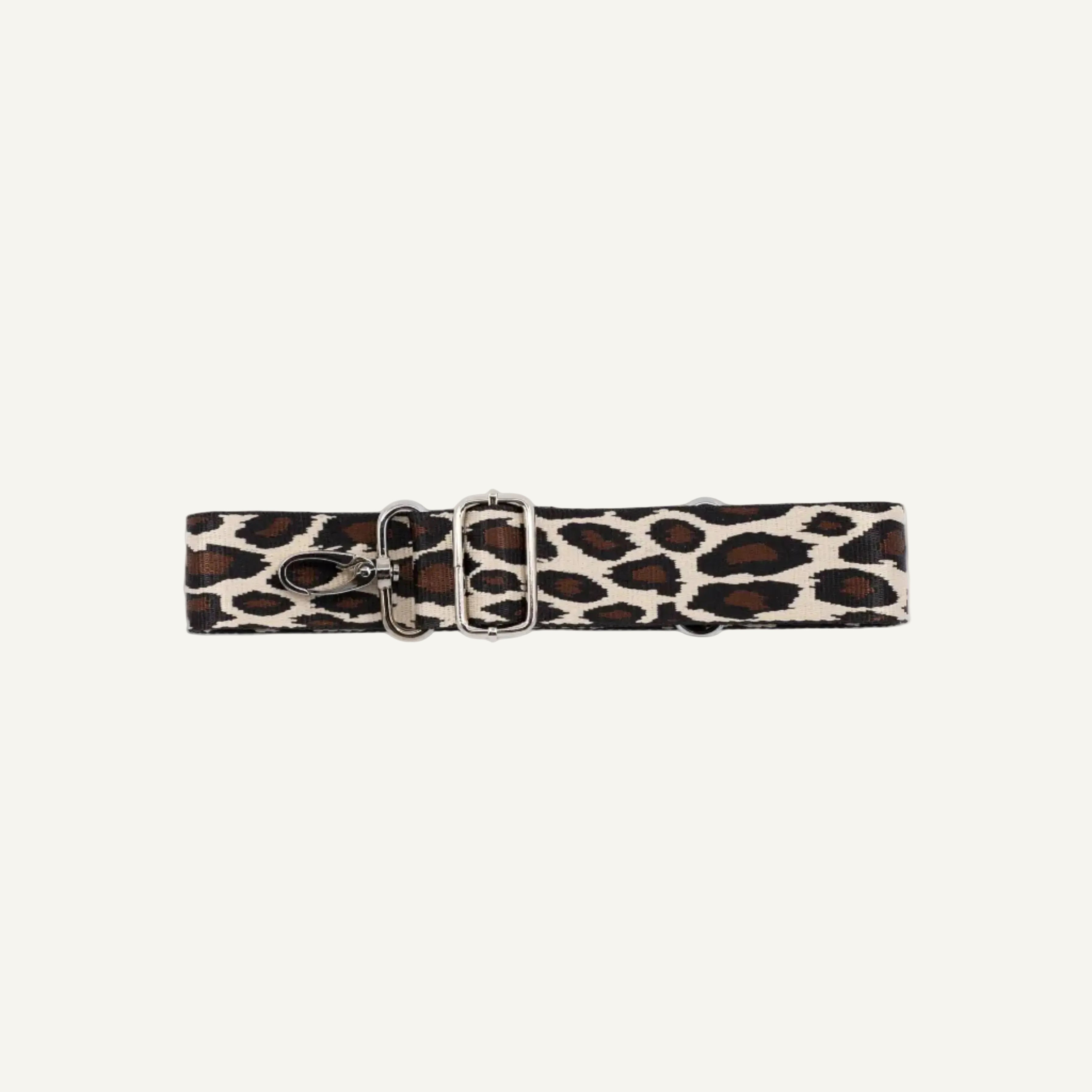 Leopard print belt with a silver buckle on a white background