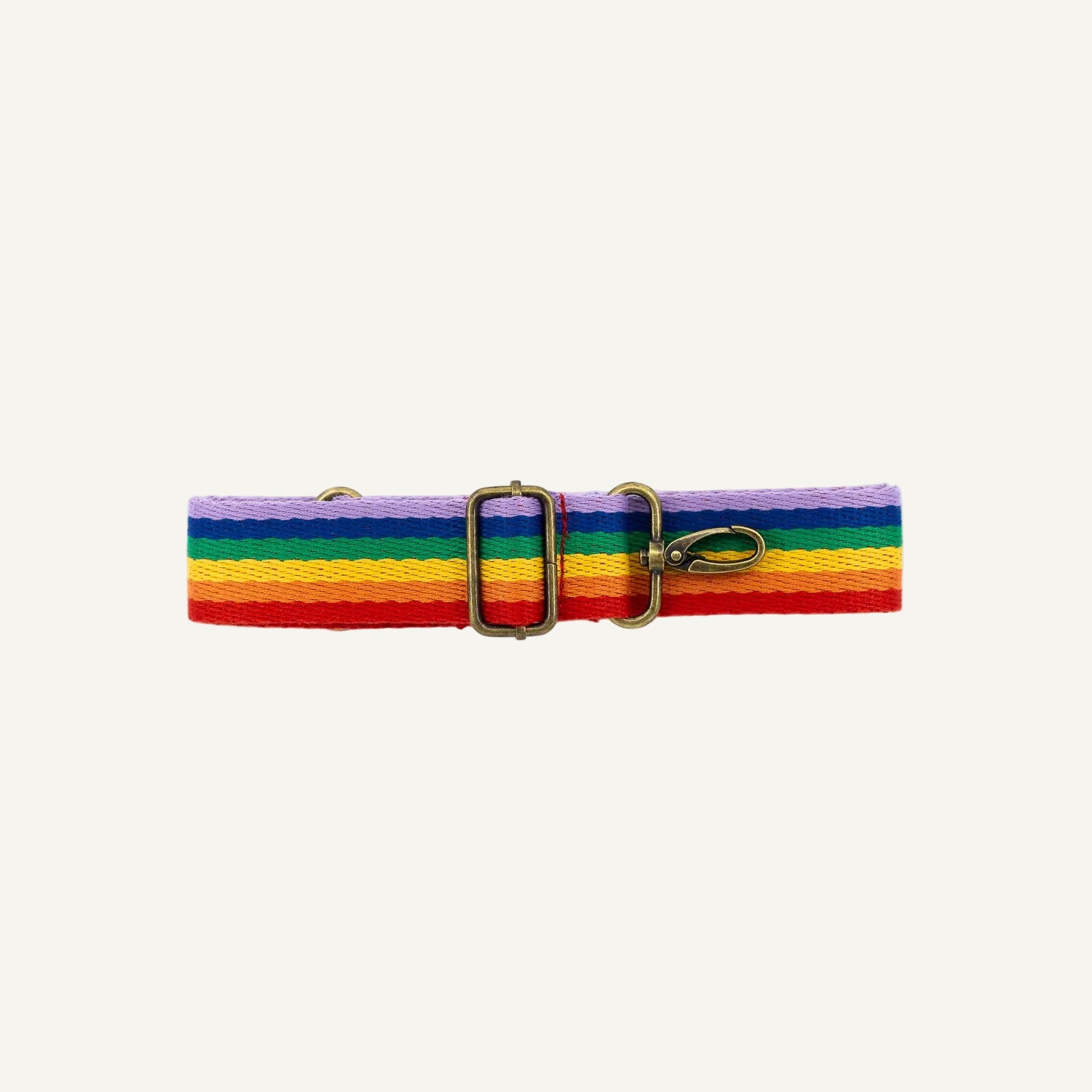 Multicolored striped strap with a gold clips on a white background