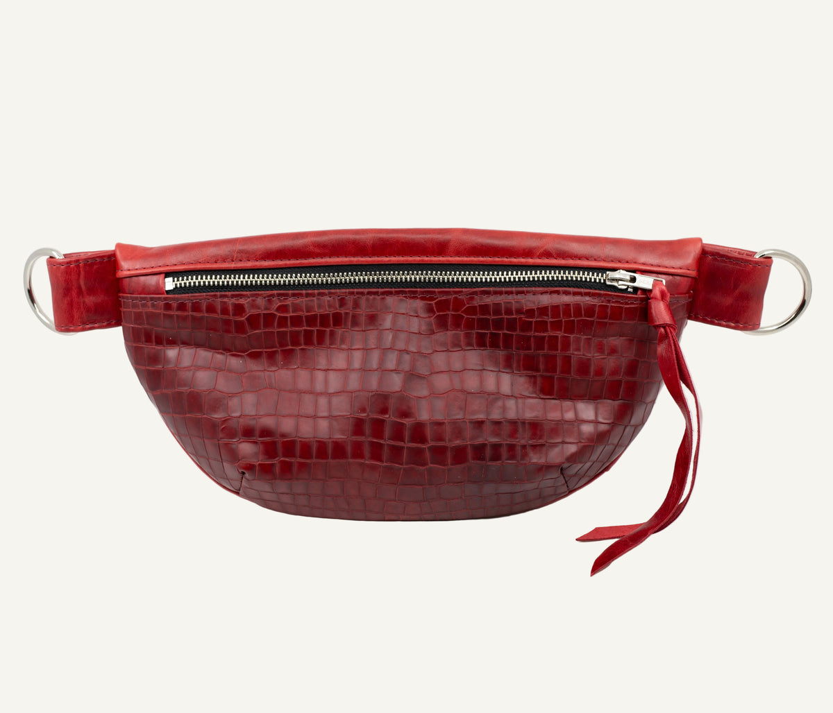 Red textured fanny pack on a white background