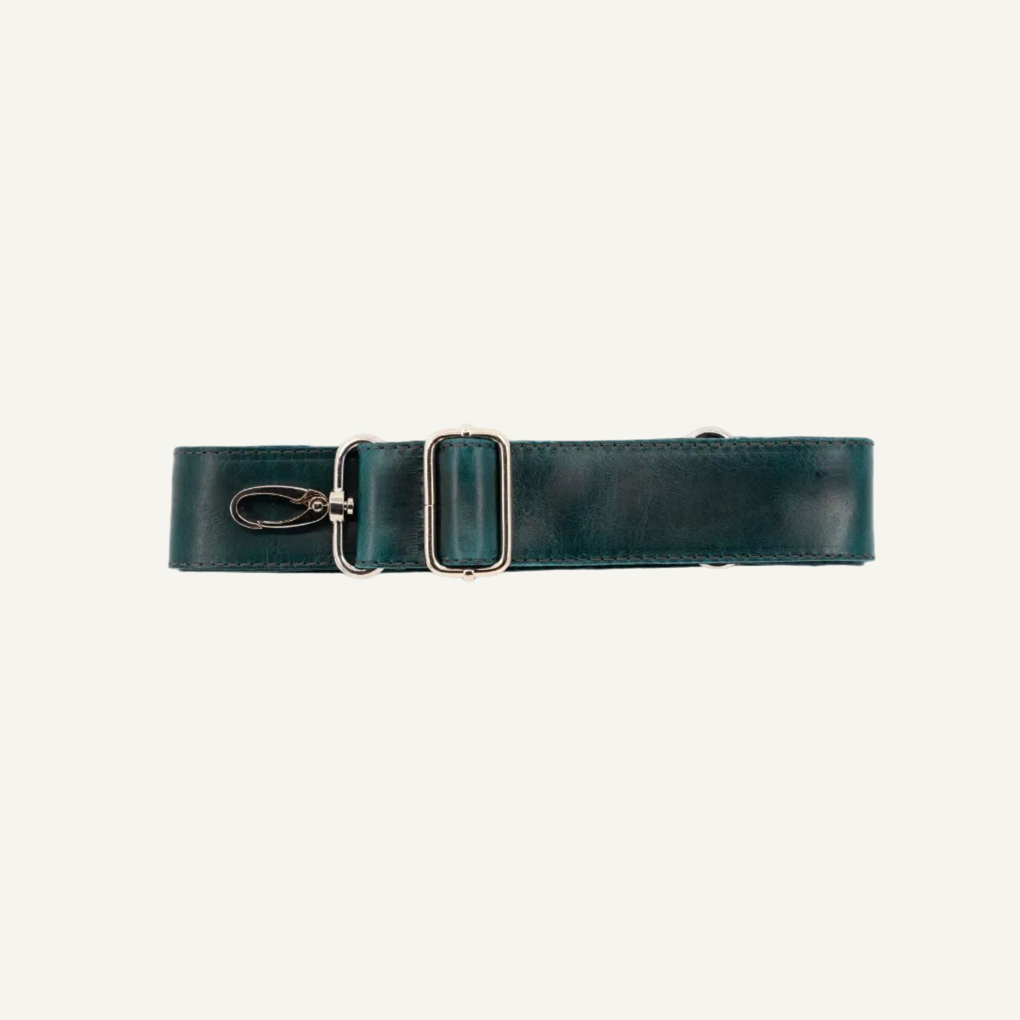 A dark teal green leather strap with a silver-toned metal clips, laid flat on a white background.