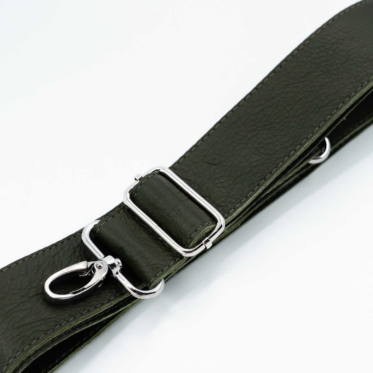 An olive green textured leather strap with silver-tone metal hardware, including a buckle, adjustment loop, and lobster clasp, shown on a clean white background.