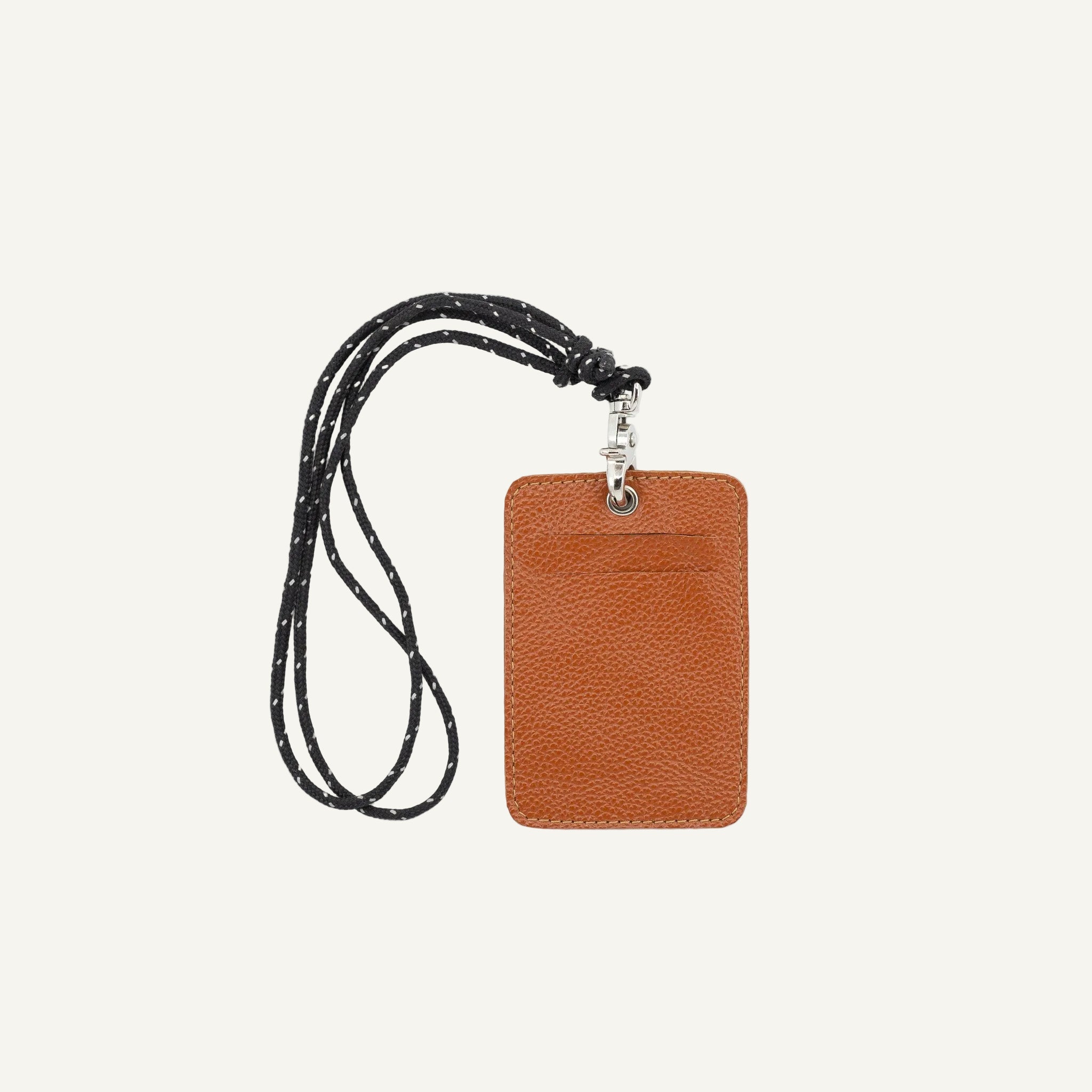 Brown leather ID card holder with black lanyard on a white background