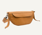Brown leather bag on a white background
