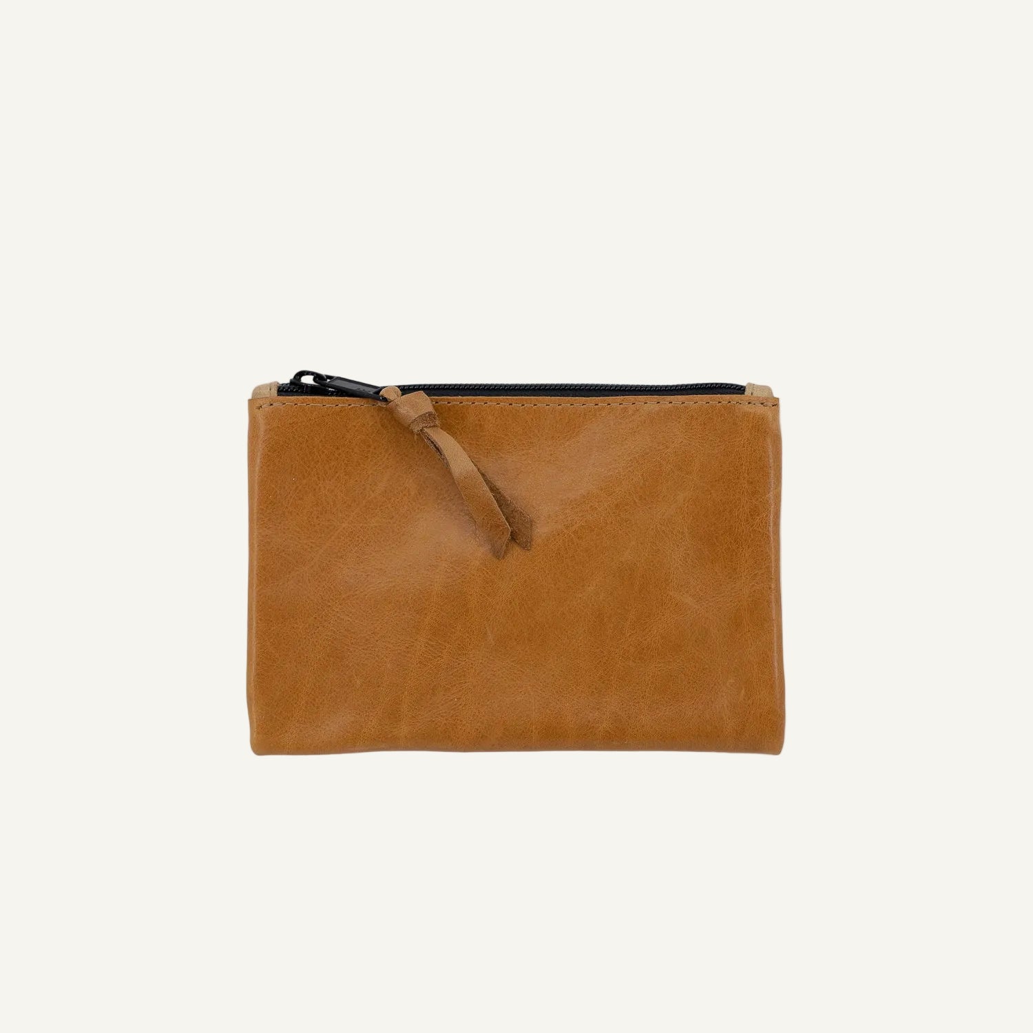 Brown leather pouch with a zipper on a white background