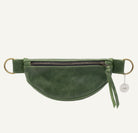 Green leather waist bag with a gold zipper on a white background