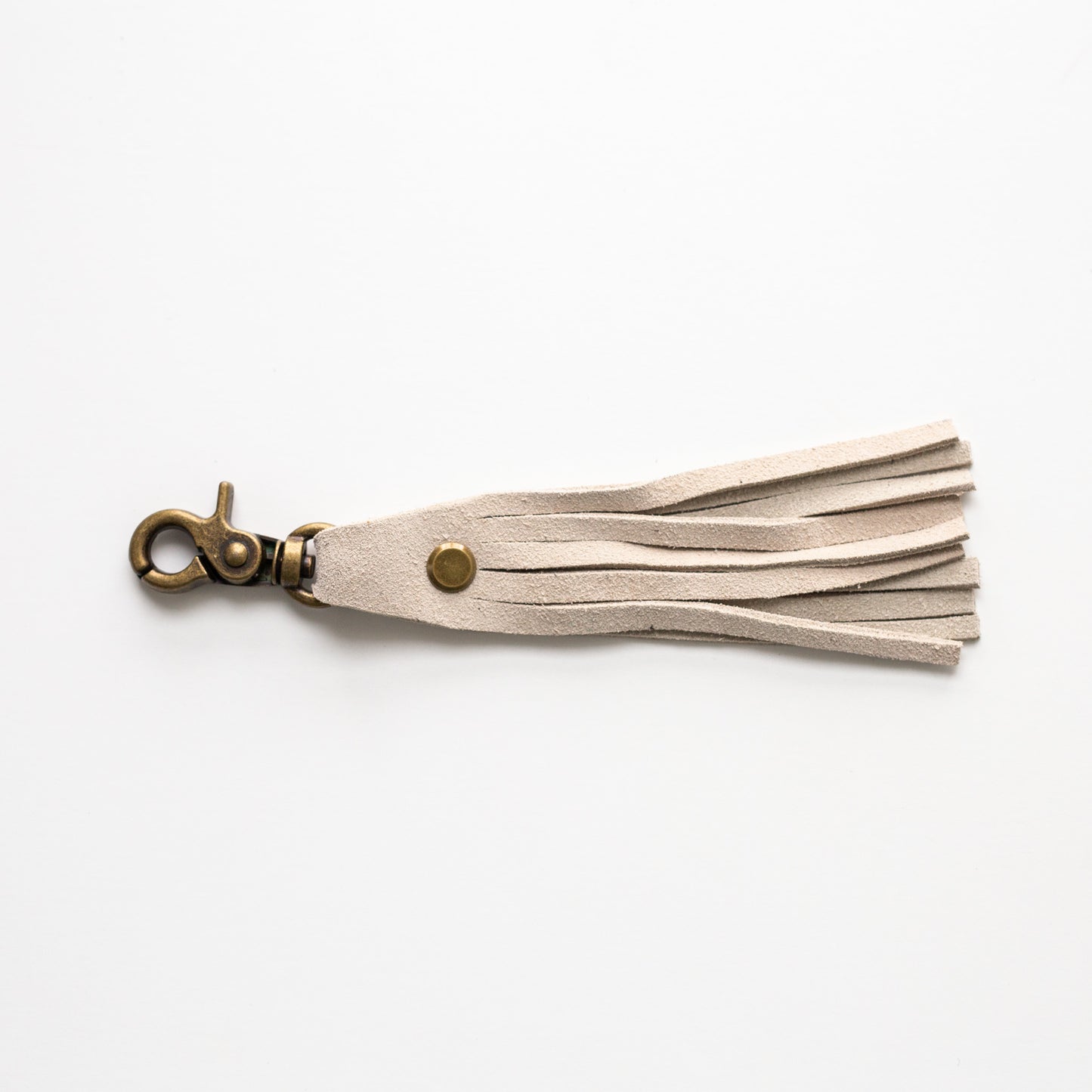 Tassel Clip - Suede Cream with Brass