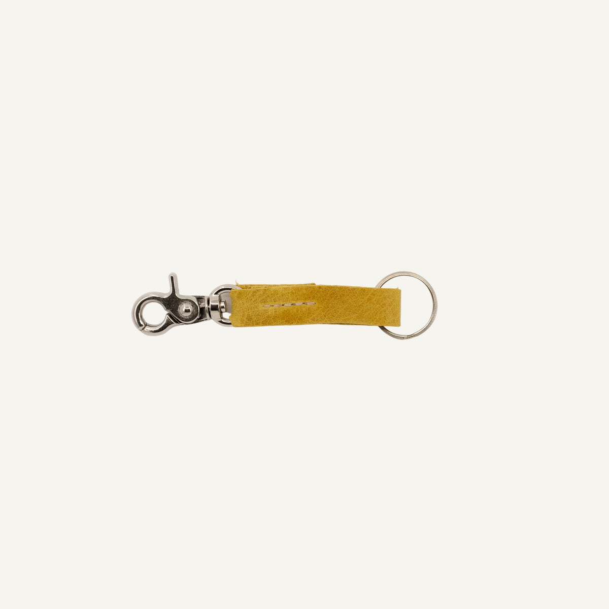 Yellow keychain with metal clip on a white background