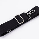 A black cotton detachable strap with a chrome clip, displayed on a white background