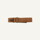A brown leather belt with a brass buckle and a metal swivel snap hook, laid flat on a white background.