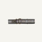 Black belt with geometric pattern and gold clip on a white background