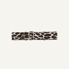 Leopard print belt with a silver buckle on a white background