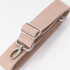 light pink leather strap with silver clips on a white background
