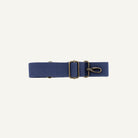 Navy blue strap with brass clip on a white background