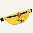 Yellow waist bag with black graphics and a red clip on a white background