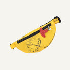 Yellow waist bag with black strap and red clip on a white background