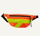 Neon orange and yellow waist bag on a light gray background