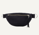 A black ribbed corduroy waist bag with a top zipper, silver-tone metal D-rings, and a black leather tassel pull, shown against a plain white background.
