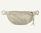A beige leather fanny pack with a zippered front, adjustable strap, and gold-tone hardware, shown against a plain white background.
