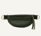 An olive green faux leather fanny pack with a front zipper pocket, adjustable strap, and gold-tone metal hardware, shown against a plain white background.
