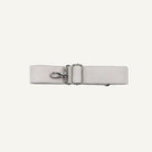 A light beige leather belt with a silver metal swivel snap closure and rectangular buckle, displayed horizontally on a clean white background.